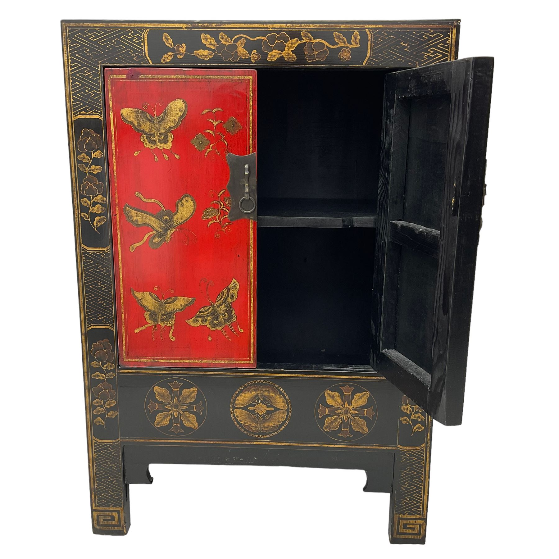 20th century Chinese black lacquered cabinet, rectangular body with two doors enclosing single shelf interior, adorned with gilt butterfly and floral motifs against a red backdrop, standing on square supports