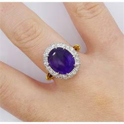 18ct gold oval cut amethyst and diamond cluster ring, hallmarked, amethyst approx 4.05 carat