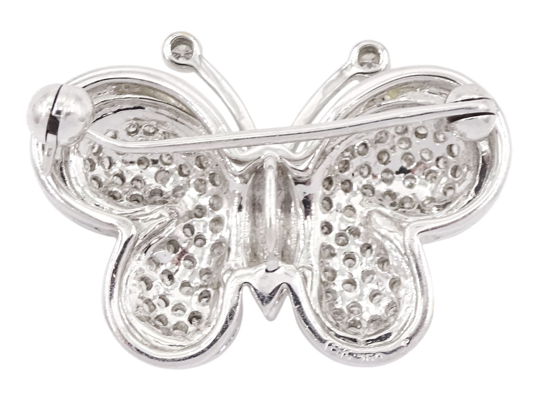 18ct white gold pave set diamond butterfly suite including ring, pair of stud earrings and pendant / brooch, all stamped 750