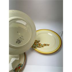 Four Clarice Cliff plates, to include Bizzare Sunshine pattern plate, two Bizarre Honeyglaze pattern plates and a Corolla pattern tea plate, all with printed mark beneath, largest D26cm
