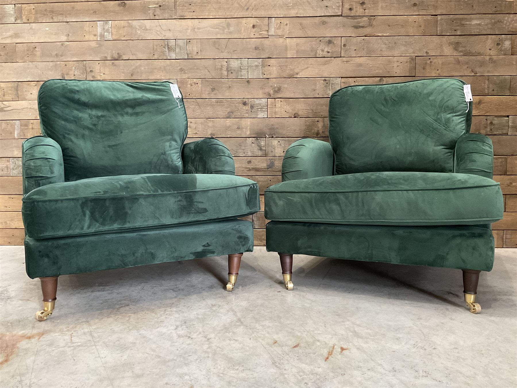 Pair of Howard design armchairs, upholstered in jade green velvet fabric