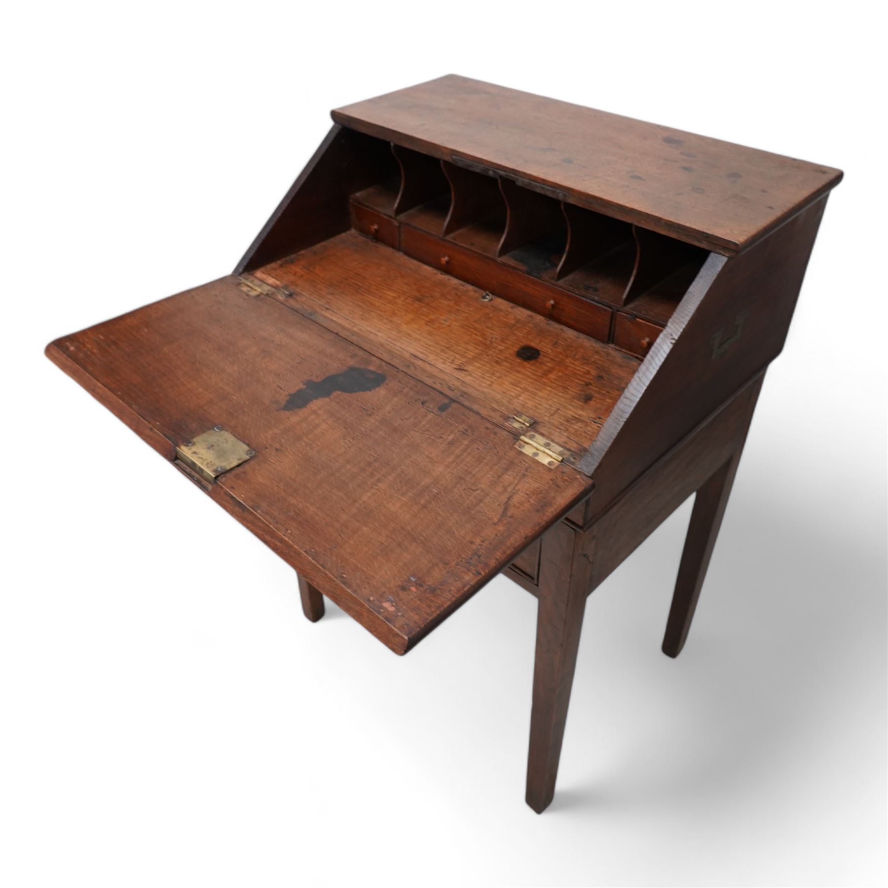 18th century oak campaign bureau, the removable top section enclosed by sloped lid, with fitted interior and carrying handles, on stand fitted with single drawer on square tapering supports