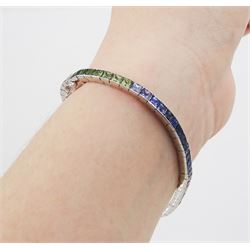 18ct white gold channel set multicoloured sapphire bracelet, sixty-one princess cut sapphires, various hues including blue, pink, green, yellow and teal, London 2004