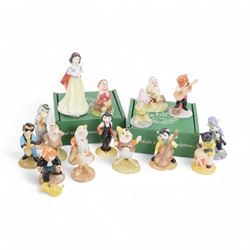 Royal Doulton figures Snow White and Seven Dwarfs, together with eight Beswick cat band fi...