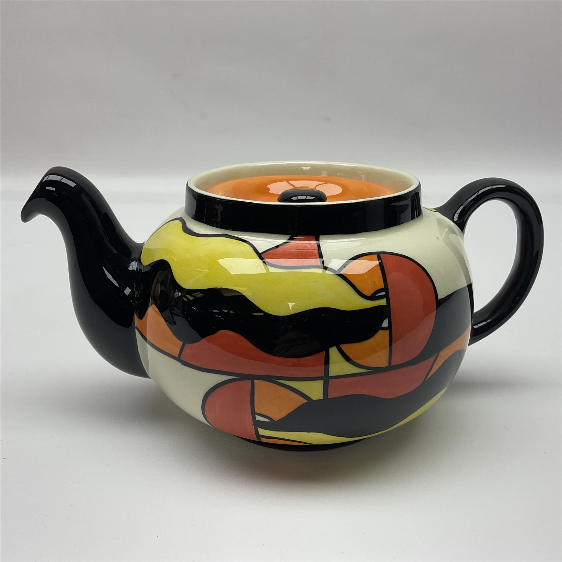 Lorna Bailey Mirage pattern teapot, together with Lorna Bailey batmobile egg cup, both signed beneath, teapot H10cm