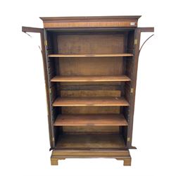 Georgian design mahogany bookcase display cabinet, fitted with two glazed doors, adjustable shelves, on bracket feet