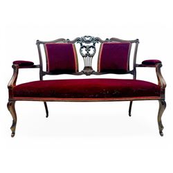 Late Victorian stained beech framed sofa, the backrests, seat and padded arms upholstered ...