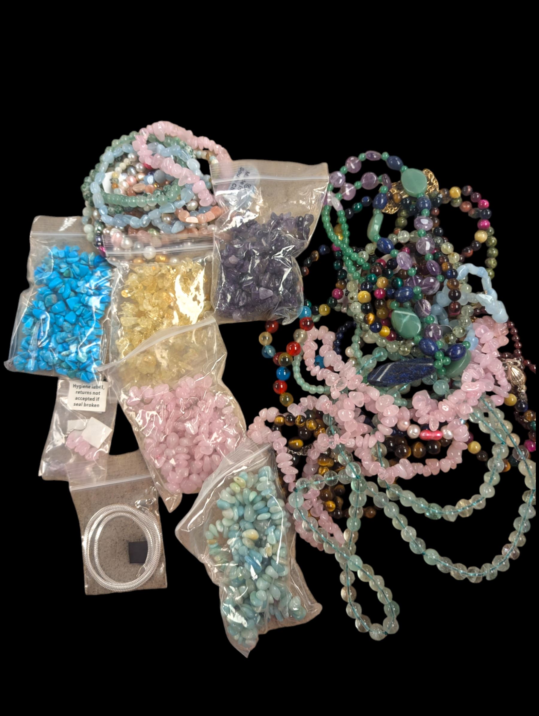 Collection of bead necklaces, bracelets and other jewellery, including tiger's eye, gate, rose quartz etc 