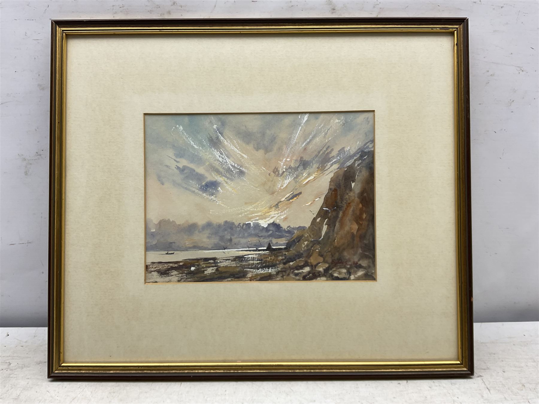 Desmond 'Des' G Sythes (British 1929-2008): 'Sunrise over Black Nab - Saltwick Bay Whitby' , watercolour and gouache signed and dated '88, labelled verso 21cm x 28cm