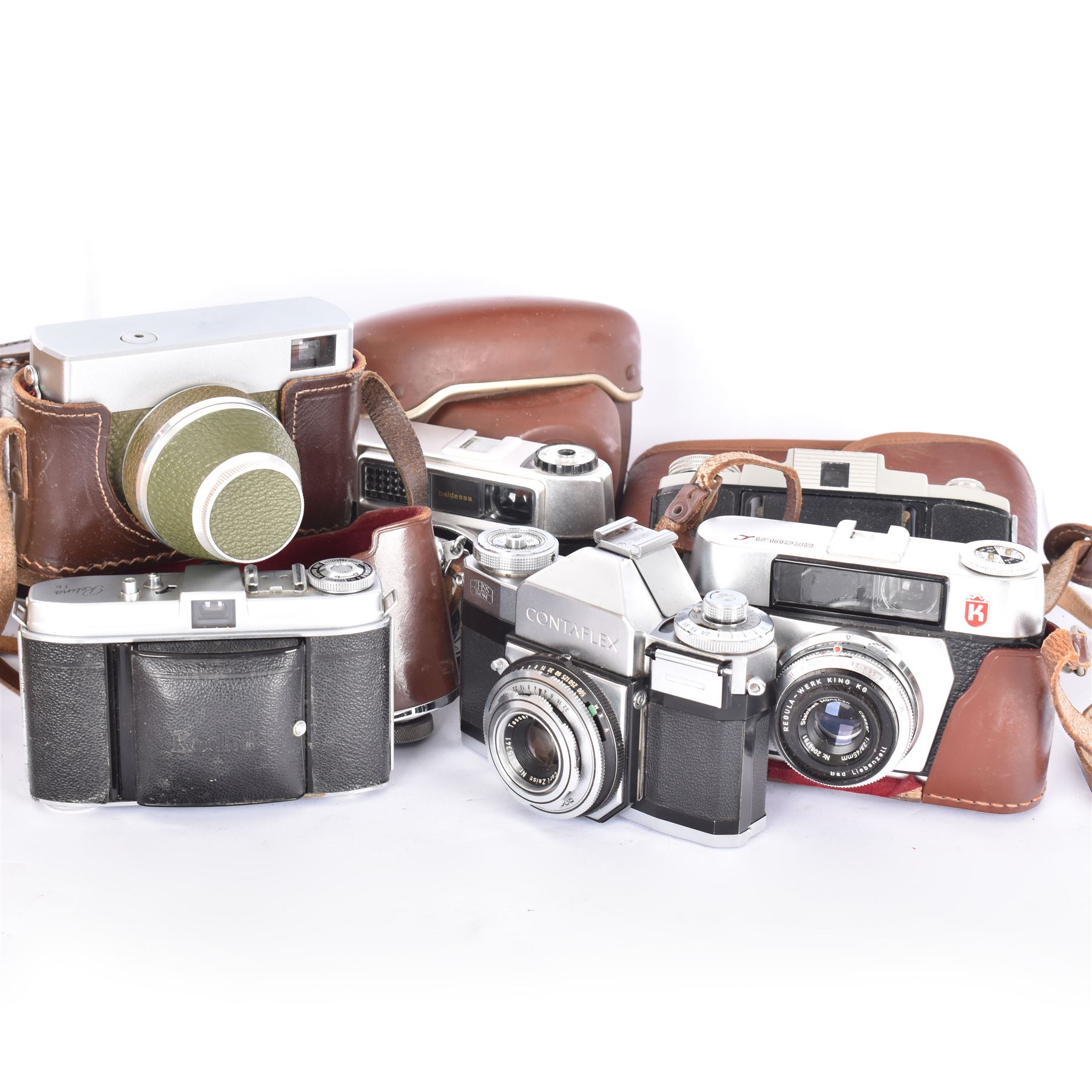 Collection of 35mm rangefinder cameras and similar, to include King Regula L, Balda Baldessa serial no. 370514, Synchro Compur MX V, Kodak Retina Ib serial no. 179811, Kodak 66 Model II and a Zeiss Ikon Contaflex, all with brown cases, with two leather camera bags and accessories