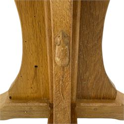 Mouseman - oak occasional table, octagonal adzed top, cruciform pedestal on sledge feet, carved with mouse signature, by the workshop of Robert Thompson, Kilburn 