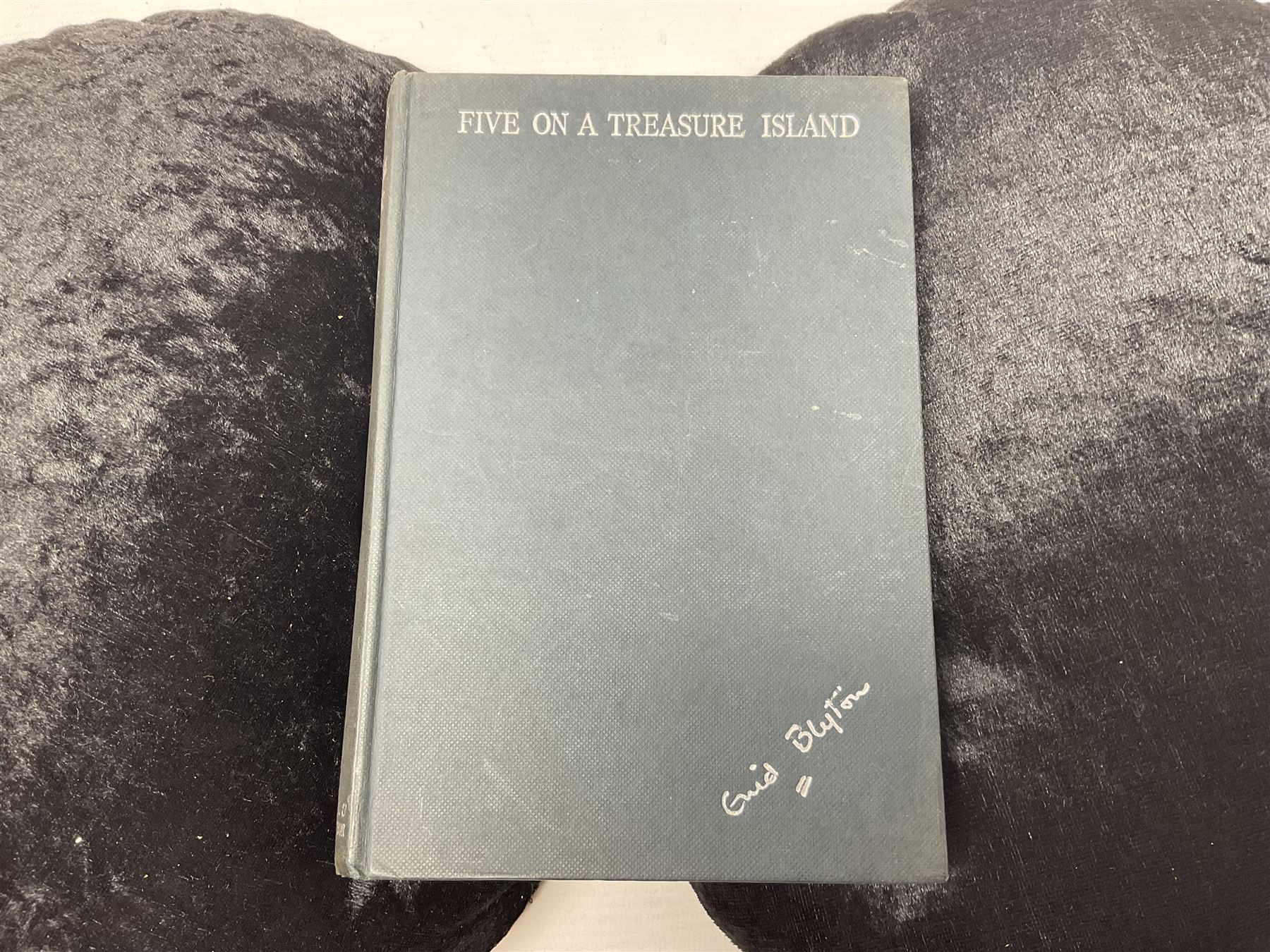 Enid Blyton; three copies of The First Adventure of the Famous Five; Five on Treasure Island, comprising 1963 edition, 1949 edition and 1963 edition  