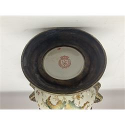 Wong Lee, twin handled ceramic urn with enamelled floral decoration and bronzed metal mounts, marked to base, height 33cm