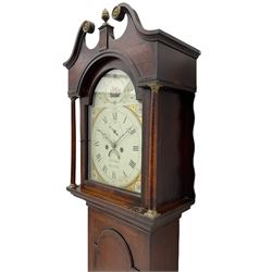 An early 19th century longcase clock, retailed by  “Thomas Mills, Berkley”, the oak case with mahogany banding, swan’s neck pediment, brass paterae and central brass finial, with shaped backsplats and a stepped break arch hood door flanked by two pillars with brass capitals, trunk with a long break arch topped door on a rectangular plinth with a raised panel and shaped skirting, a twelve-inch wide painted dial with a depiction of flowers to the arch and corresponding floral images to the spandrels, with Roman numerals and quarter hour Arabic’s, minute track and matching steel hands, with winding collets, subsidiary seconds dial and semi-circular date aperture with calendar disc behind, dial pinned via a Walker and Finmore cast iron false plate to a four pillar, eight-day rack striking weight driven movement with a recoil anchor escapement, striking the hours on a cast bell, with key, weights and pendulum.
                
