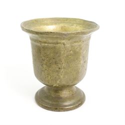 Three 19th century pestles and mortars, including a turned example with flared rim, an Eastern mortar with engraved decoration and pedestal foot, H16.5cm and one other (3)