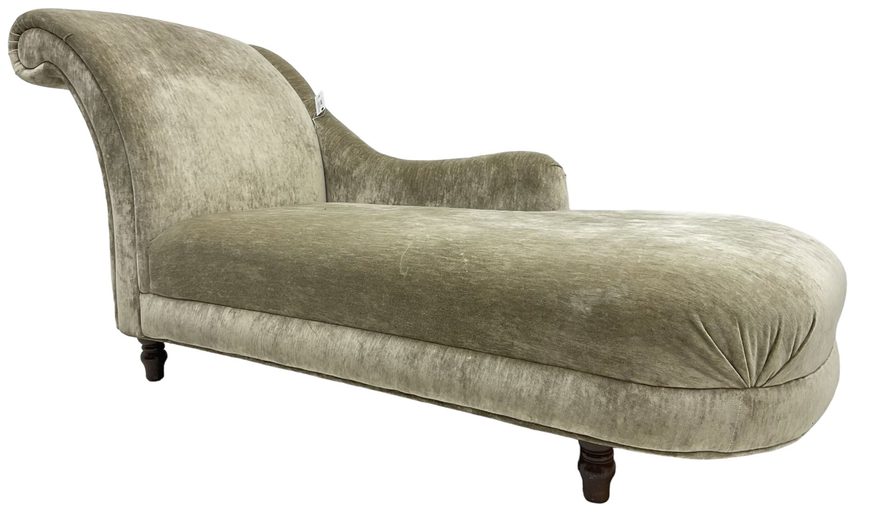 Contemporary chaise longue with scrolled back, upholstered in champagne crushed velvet, on turned feet