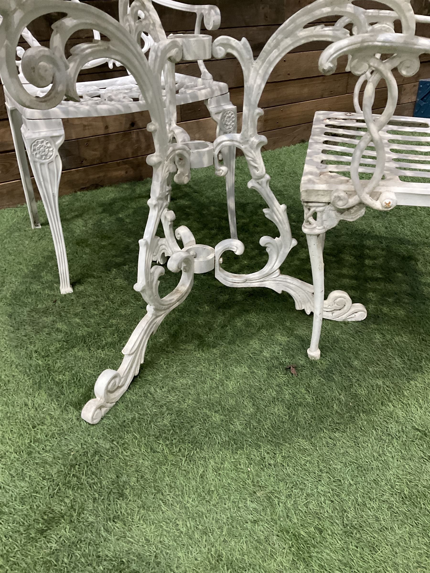 Cast aluminium circular garden table and three chairs - THIS LOT IS TO BE COLLECTED BY APPOINTMENT FROM DUGGLEBY STORAGE, GREAT HILL, EASTFIELD, SCARBOROUGH, YO11 3TX