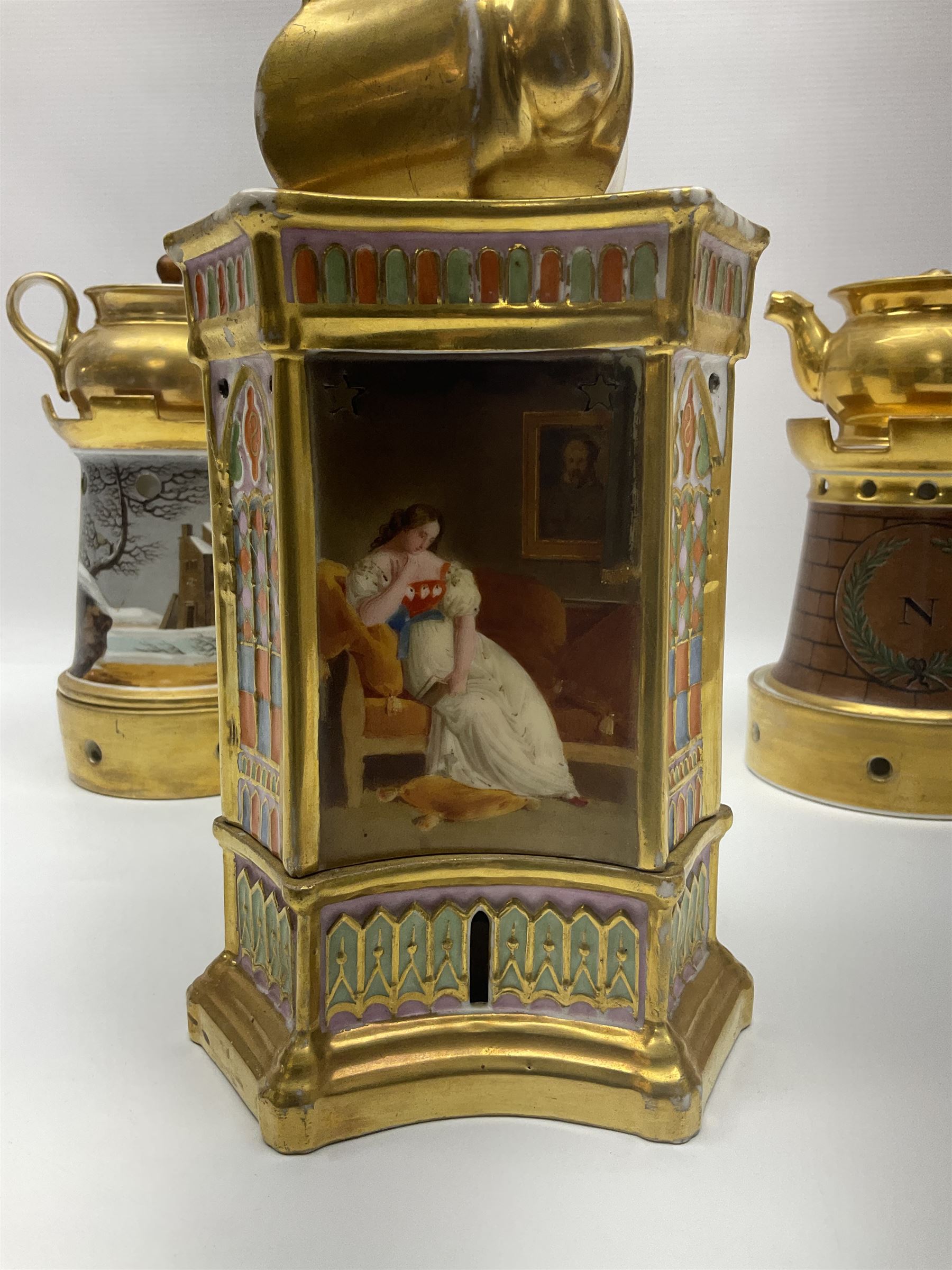 Three 19th century continental teapots and warmers, the first teapot upon a hexagonal warming base, painted with figures in period dress, the second pained with Neapolitan and the third decorated with landscapes, largest H28cm 