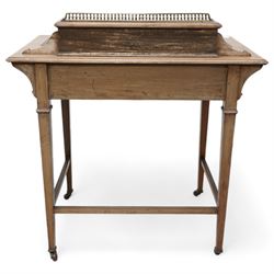 Edwardian inlaid mahogany writing desk, raised correspondence compartment over leather inset top, fitted with single drawer, on square tapering supports with brass and ceramic castors 