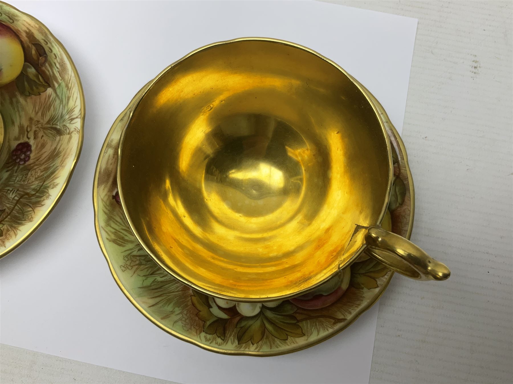 Pair Aynsley Orchard Gold pattern teacups and saucers with gilt interior 