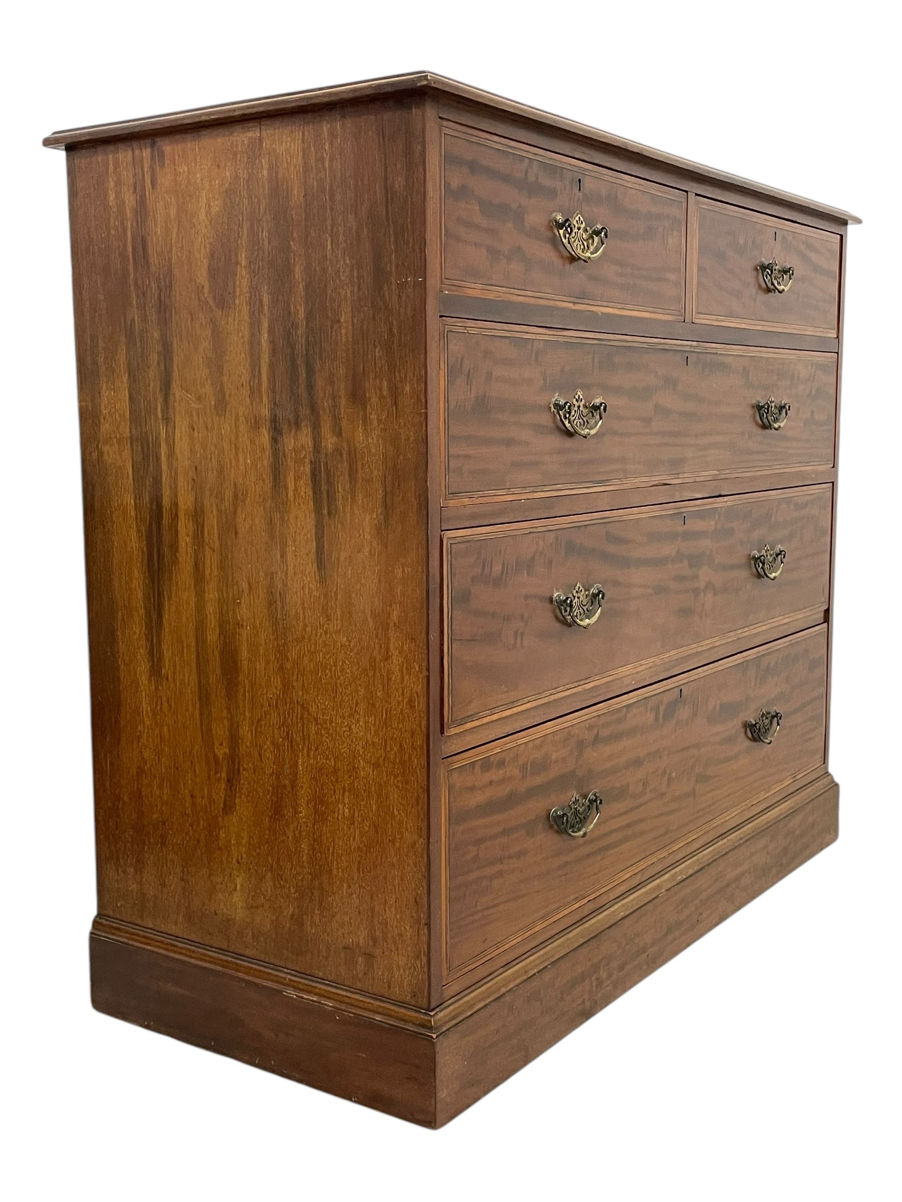 Late Victorian mahogany chest, moulded rectangular top over two short and three long graduating drawers, the drawer fronts inlaid with satinwood bands, boxwood and ebony stringing, on moulded plinth base 