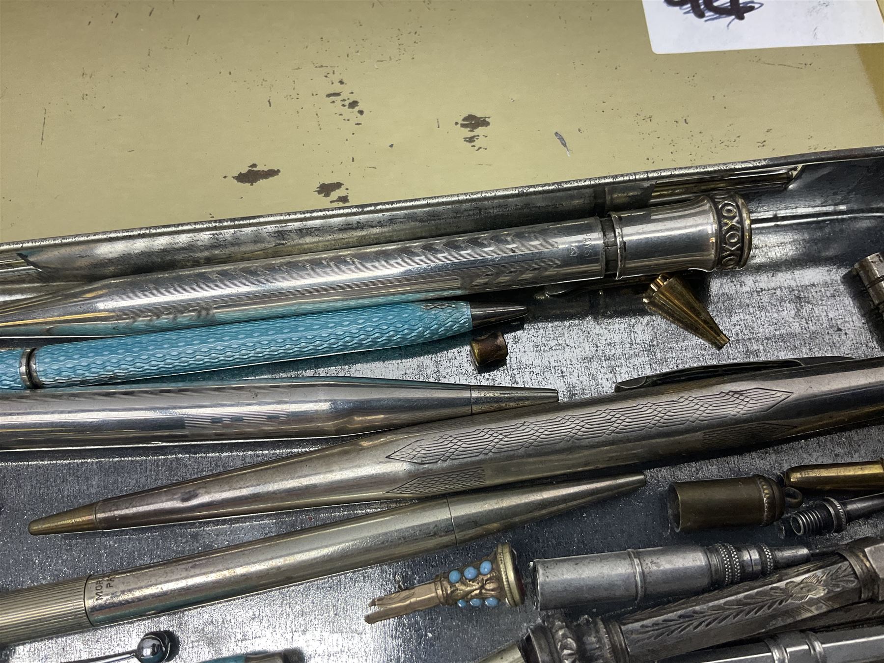 Collection of silver and other propelling pencils, including guilloche enamel example and oddments 