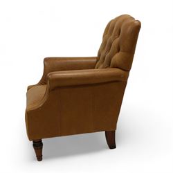 Laura Ashley Lancaster Georgian design armchair, upholstered in buttoned Colorado tanleather, with matching footstool