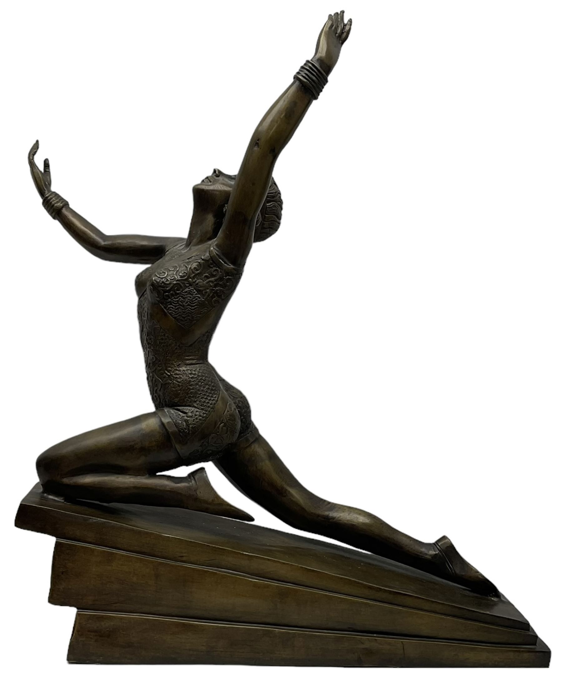 Large bronzed Art Deco style figure of a dancer, on stepped base, H71cm