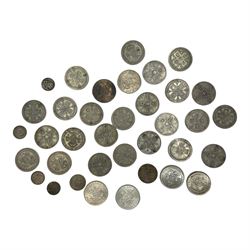 Approximately 345 grams of Great British pre 1947 silver coins, including two shillings or florins, threepence pieces etc