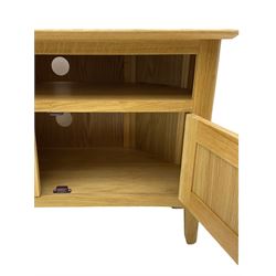 Contemporary light oak corner television stand, hexagonal top over recessed shelf, fitted with two panelled cupboard doors with chrome handles, on straight supports with rounded inner edges