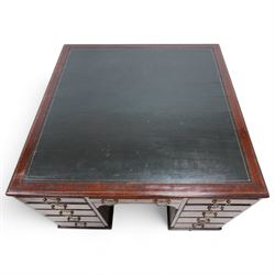 19th century inlaid mahogany kneehole desk, moulded rectangular top with inset leather writing surface and satinwood band, one side fitted with eleven drawers and panelled cupboard, the opposing side with kneehole fitted with eleven drawers and double cupboard, on skirted base with moulded edge 