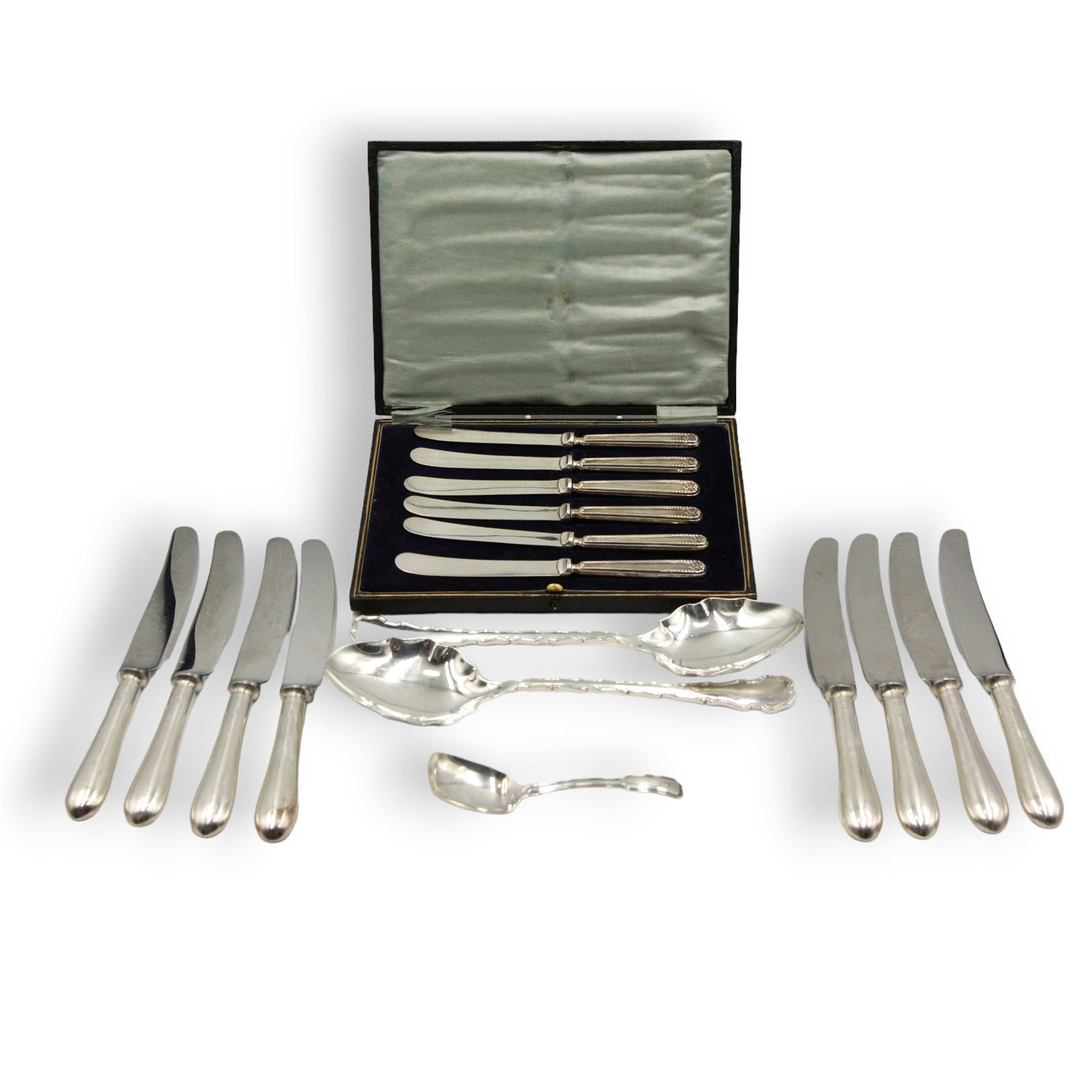 Set of eight silver handled dessert knives Sheffield 1977 Maker William Yates Ltd, pair of silver serving spoons Sheffield 1906 Maker Lee & Wigfull, early 19th century silver caddy spoon and set of six silver handled pastry knives 