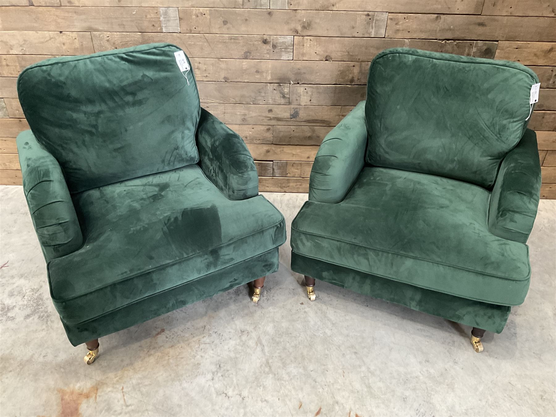 Pair of Howard design armchairs, upholstered in jade green velvet fabric