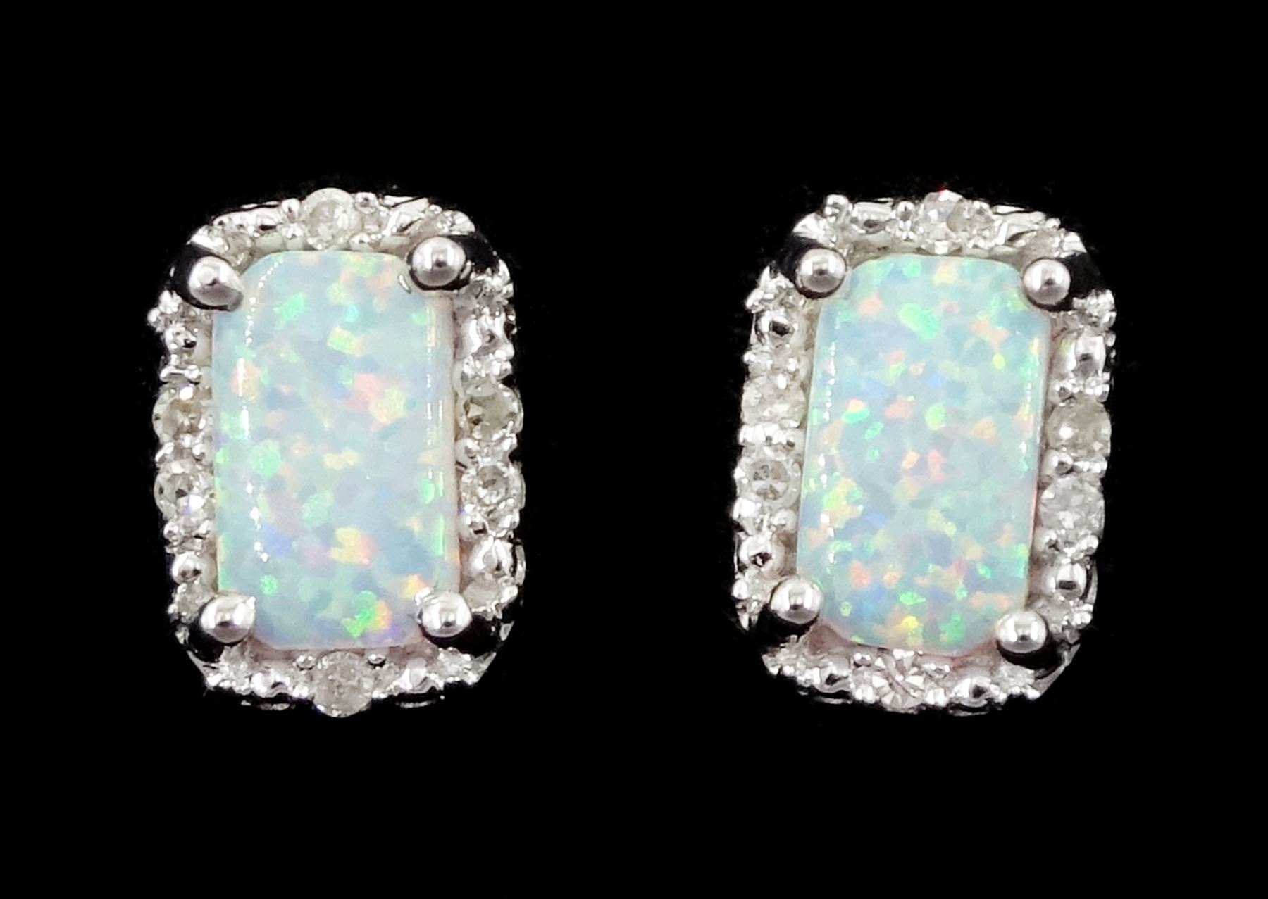 Pair of 9ct white gold opal and diamond stud earrings, stamped 375