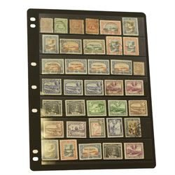 West Indies - Antigua, Bahamas with War Tax overprints, Bahamas postal stationary, British Guiana, British Honduras, Virgin Islands, Cayman Islands, Dominica, Grenada, Jamaica etc, housed on pages in a ring binder folder