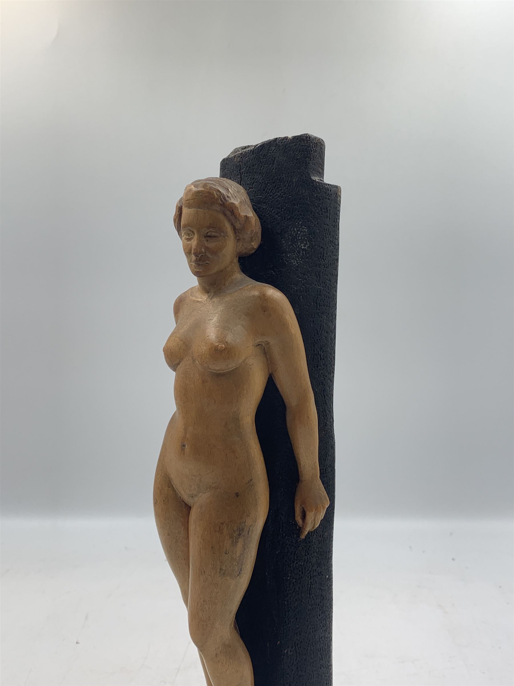 R Flint - 20th century carved wooden figural sculpture of a nude female, signed 