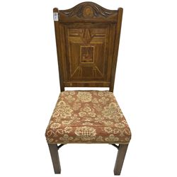 19th century walnut side chair, foliage carved cresting rail over geometric inlaid back with central panel depicting buildings, upholstered seat, on moulded and chamfered square supports