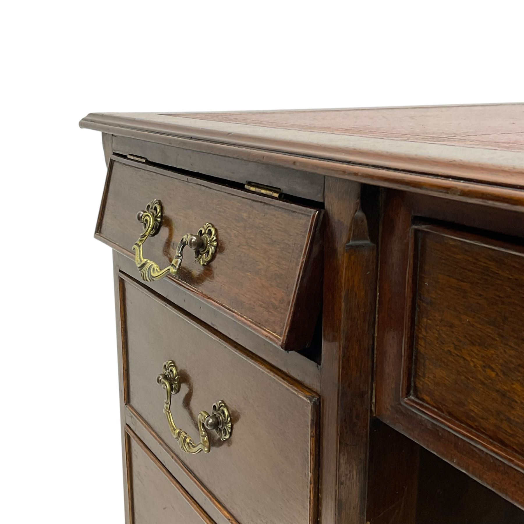 Georgian design mahogany twin pedestal desk, moulded rectangular top with red leather inset, fitted with seven drawers, on bracket feet 