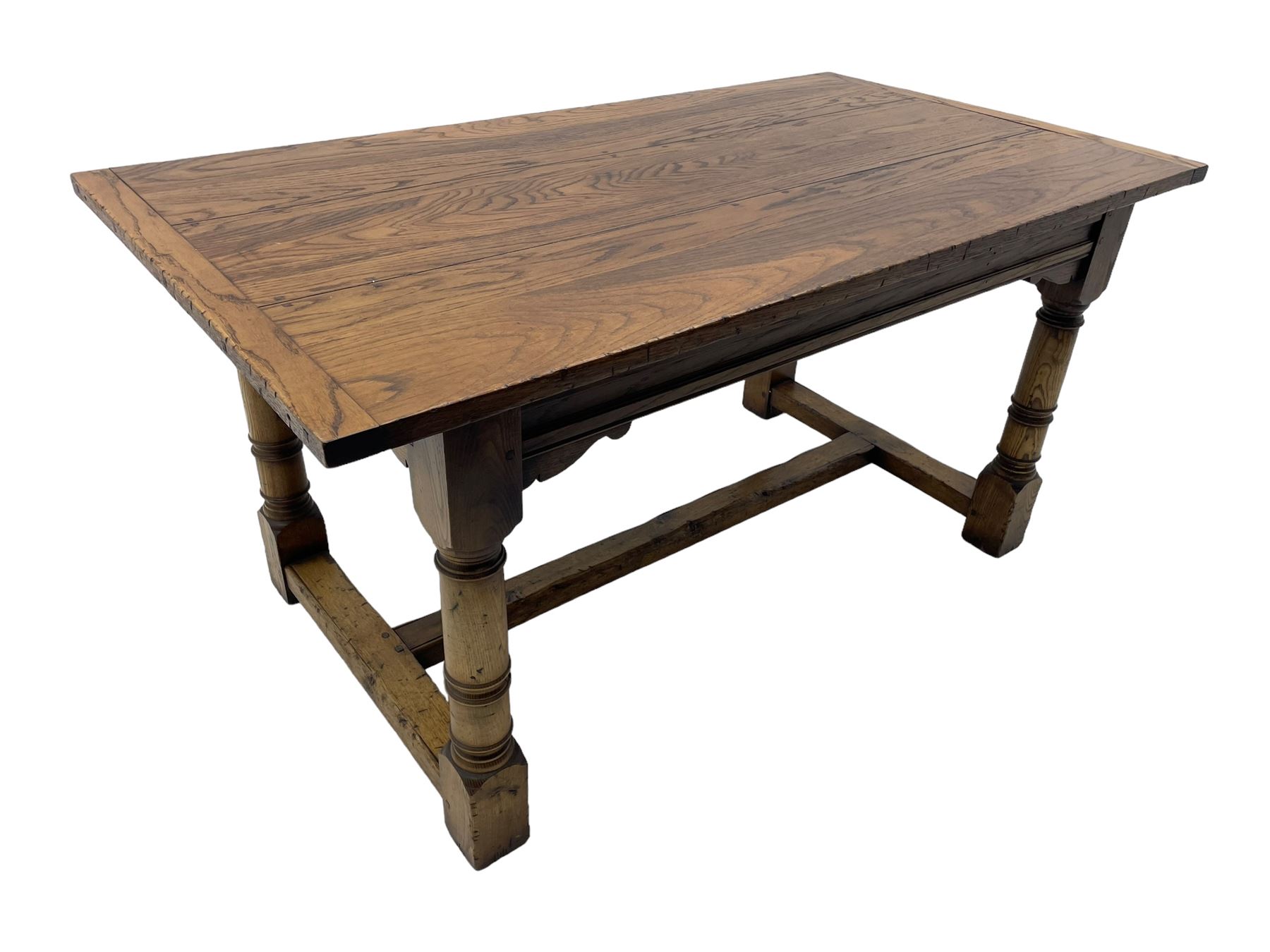 Oak refectory dining table, rectangular three plank top with cleated ends, two additional leaves, on turned supports united by H-stretchers 