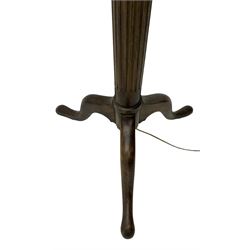 20th century mahogany standard lamp, fluted column on tripod base, with shade 