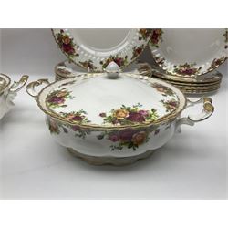 Royal Albert Old Country Roses pattern part tea and dinner service, to include two tureens, eight dinner plates, six side plates, twelve bowls, two mugs, seven teacups and saucers, milk jug,  twelve cake plates, six soup bowls and saucers, candlesticks, etc (95)