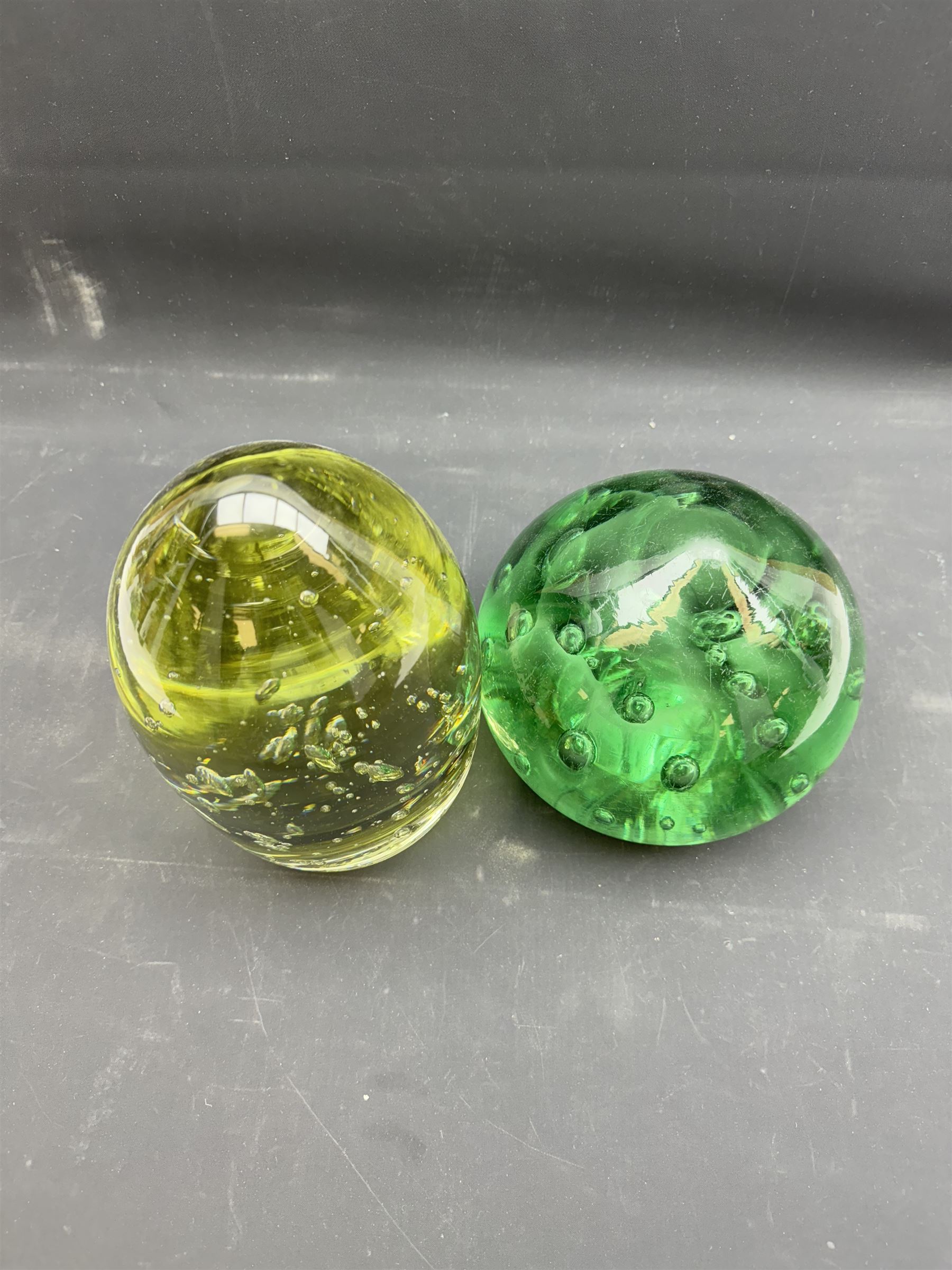 Two extra large Victorian glass dumps, with bubble inclusions tallest H22cm