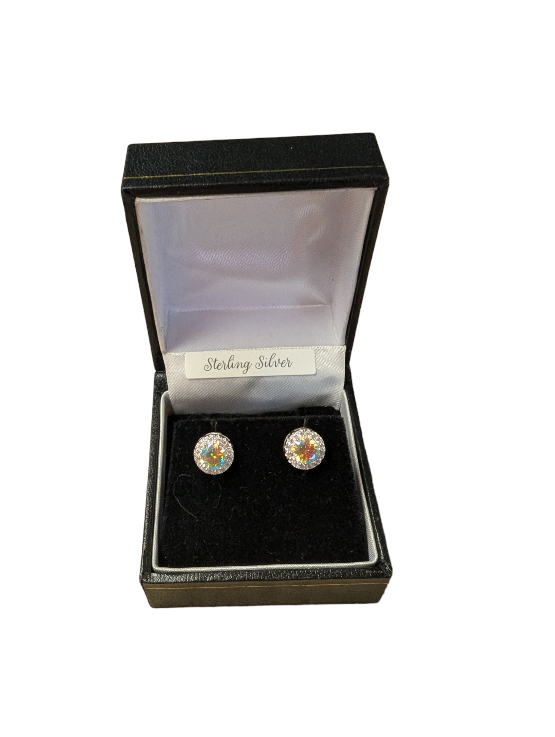 Pair of silver cubic zirconia stud earrings, stamped, boxed