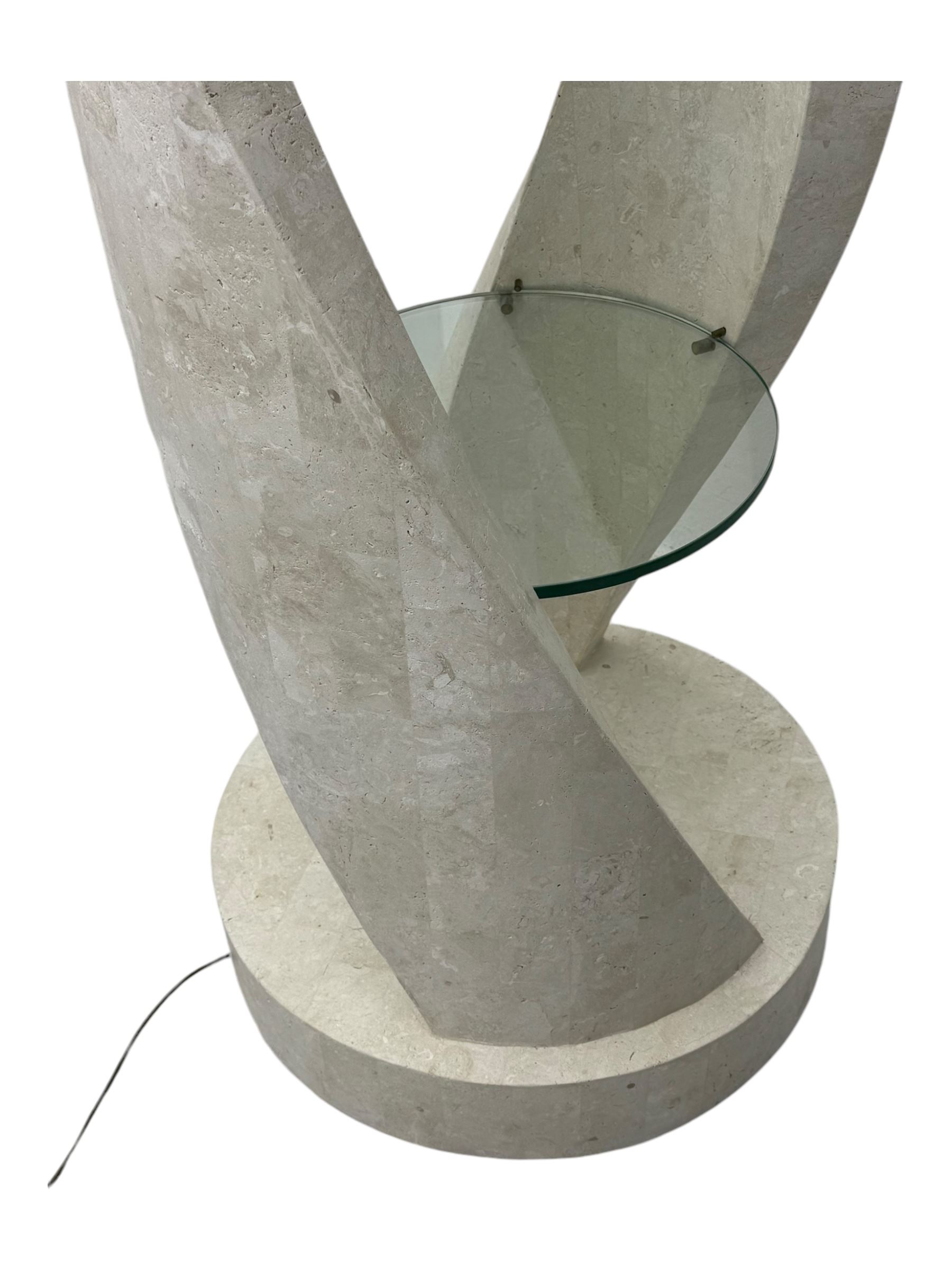 Composite stone display stand, circular twist form, fitted with three glass shelves