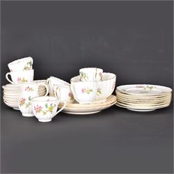 Coalport part tea service, decorated with floral sprigs, including eight cups and saucers, milk jug, eight dessert plates etc  