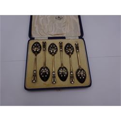 Set of six 1930s silver-gilt and enamel coffee spoons, the bowls and finials decorated verso in black and white enamel, hallmarked Turner & Simpson Ltd, Birmingham 1933, contained within fitted case