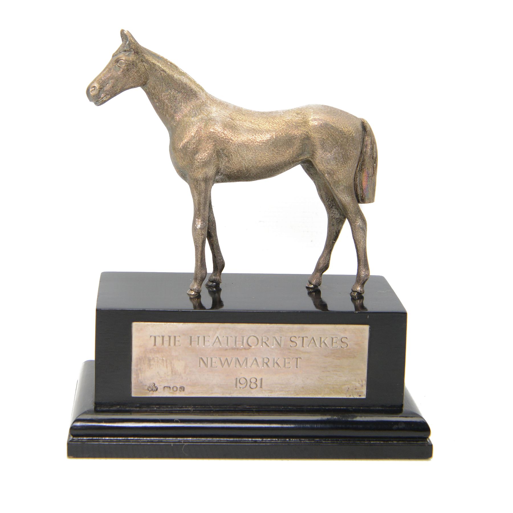 'The Heathorn Stakes, Newmarket 1981' - Silver model of a standing horse on ebonised plinth with silver plaque H20cm x W18cm London 1978 Maker Wakely & Wheeler