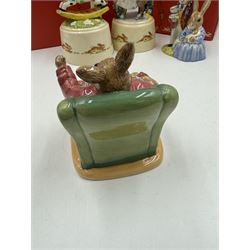 Two Royal Doulton Bunnykins music boxes, comprising Rocking Horse and Winter Waltz together with two Royal Doulton Bunnykins figures Once Upon a Time and Father, Mother & Victoria, all with original boxes  