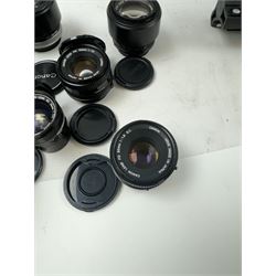 Seventeen Canon camera lenses, mostly FD examples, including 28-85mm 1:4 serial no, 49881, 35-105mm 1:3.5-4.5 serial no. 87632 and 135mm 1:2.8 serial no. 48336, one boxed