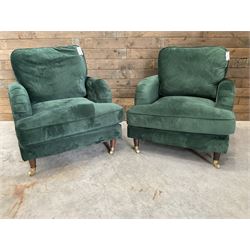 Pair of Howard design armchairs, upholstered in jade green velvet fabric